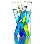 Test tubes filled with chemicals resting in a beaker.