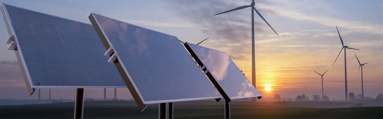 Imagen del paisaje con paneles solares y turbinas eólicas durante una puesta de sol.